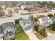 Bird's eye view capturing the home's roof, front yard, and positioning within the neighborhood at 3809 Mardela Spring Dr, Raleigh, NC 27616
