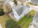 Rear aerial view showing the roof, backyard, back deck, and privacy fence at 3809 Mardela Spring Dr, Raleigh, NC 27616