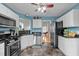 Stylish kitchen featuring stainless steel appliances, ample cabinet space and granite countertops at 3809 Mardela Spring Dr, Raleigh, NC 27616