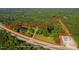 Acreage featuring mature trees and pond, outlined in red to show property lines at 4200 Us 1 Highway South, Kittrell, NC 27544