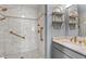 Neutral tiled shower with glass door, corner seat, and bronze fixtures at 4200 Us 1 Highway South, Kittrell, NC 27544