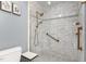 Updated bathroom featuring a glass shower with marble-look tile and bronze fixtures at 4200 Us 1 Highway South, Kittrell, NC 27544