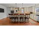 Stylish kitchen with stainless steel appliances, granite countertops, and a cozy breakfast bar area at 4200 Us 1 Highway South, Kittrell, NC 27544