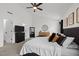 Comfortable main bedroom featuring plush carpet, neutral walls, a ceiling fan, and abundant space at 5332 Seaspray Ln, Raleigh, NC 27610