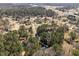 Vast aerial view of a residential area with winding streets and lush greenery at 5504 Quails Call Ct, Garner, NC 27529