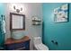 Stylish half bathroom featuring modern fixtures and a unique design at 5504 Quails Call Ct, Garner, NC 27529