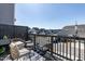 Back porch seating area overlooks the neighborhood and provides space for relaxation and entertainment at 5917 Kayton St, Raleigh, NC 27616