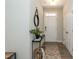 Welcoming entryway with a stylish console table and modern decor at 5917 Kayton St, Raleigh, NC 27616