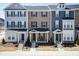 Charming townhome exterior with covered entryway and well-maintained landscaping at 5917 Kayton St, Raleigh, NC 27616