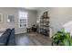 Bright corner living area featuring stylish decor and lots of natural light at 5917 Kayton St, Raleigh, NC 27616