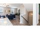 Open-concept living room with hardwood floors and lots of natural light at 5917 Kayton St, Raleigh, NC 27616