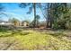 Spacious backyard with healthy green grass, and storage sheds at 608 N 15Th St, Erwin, NC 28339