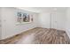Bright, neutral bedroom with modern floors and large window at 608 N 15Th St, Erwin, NC 28339