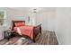 This bedroom offers great light, a comfortable bed, and up-to-date features at 608 N 15Th St, Erwin, NC 28339