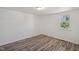 This bedroom is enhanced with wood-look flooring and a bright window providing natural light at 608 N 15Th St, Erwin, NC 28339