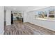 Open-concept living space showcasing updated flooring and natural light at 608 N 15Th St, Erwin, NC 28339
