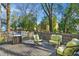 Deck area featuring a grill and outdoor seating, perfect for entertaining at 611 S Buchanan Blvd, Durham, NC 27701