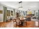 Stylish dining area with hardwood floors, chandelier, and seamless flow to the living spaces, great for Gathering gatherings at 611 S Buchanan Blvd, Durham, NC 27701