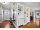 Elegant living room features custom built-ins, hardwood floors, and a stylish design, perfect for entertaining and relaxing at 611 S Buchanan Blvd, Durham, NC 27701