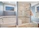 Gorgeous main bathroom features stand up shower and soaking tub at 611 S Buchanan Blvd, Durham, NC 27701