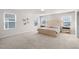 Bright Primary bedroom with mirrored nightstands and soft neutral tones at 625 Sage Oak Ln, Holly Springs, NC 27540