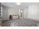 Bright bedroom featuring neutral carpet and walls, showcasing comfortable and functional living space at 63 Pale Moss Dr, Clayton, NC 27527