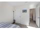 Bright bedroom featuring neutral carpet, closet and lots of natural light for a cozy space at 63 Pale Moss Dr, Clayton, NC 27527