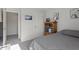 Bright bedroom with neutral carpet, offering a view of the closet and an airy atmosphere at 63 Pale Moss Dr, Clayton, NC 27527