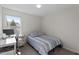 Bright bedroom with a desk and bed by a window for comfort and functionality at 63 Pale Moss Dr, Clayton, NC 27527