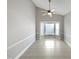 Sunlit living room with tile flooring and bay window at 6624 Professor St, Raleigh, NC 27616