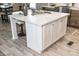 Spacious kitchen island with seating, storage, and a decorative countertop at 6646 Woodlawn Dr, Oxford, NC 27565