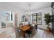 Elegant dining room with a wood table, chandelier, and a view into the foyer at 6816 Rainwater Rd, Raleigh, NC 27615