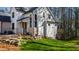 Exterior view of the home showcasing the architecture, landscaping, and curb appeal of the property at 6816 Rainwater Rd, Raleigh, NC 27615