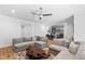 Inviting living space with hardwood floors and open sight lines to the kitchen at 6816 Rainwater Rd, Raleigh, NC 27615