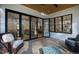 Covered patio featuring sliding glass doors, outdoor furniture and a ceiling fan at 6816 Rainwater Rd, Raleigh, NC 27615