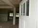Bright entryway with large windows providing views into unfinished home at 896 Olive Branch Dr, Smithfield, NC 27577