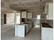 Unfinished kitchen showing the layout with island and ample cabinet space at 896 Olive Branch Dr, Smithfield, NC 27577