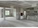 View of the open living space leading into kitchen, still under construction at 896 Olive Branch Dr, Smithfield, NC 27577
