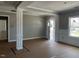 Inviting living room showcasing decorative columns and natural light at 896 Olive Branch Dr, Smithfield, NC 27577