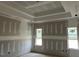 Unfinished main bedroom with two large windows providing natural light at 896 Olive Branch Dr, Smithfield, NC 27577