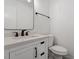 Bathroom featuring white vanity, modern black fixtures, and a toilet at 1016 N Bend Dr, Raleigh, NC 27609