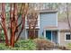 Exterior of home with blue siding, brown trim and a teal front door at 1016 N Bend Dr, Raleigh, NC 27609