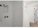Hallway featuring a laundry hook up with entry to bedroom at 1016 N Bend Dr, Raleigh, NC 27609