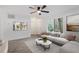Bright living room with large windows, comfortable seating, and modern decor at 1016 N Bend Dr, Raleigh, NC 27609