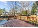 Wooden back deck overlooking a private yard, perfect for outdoor gatherings at 104 Seaman St, Oxford, NC 27565