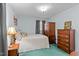 Bedroom features a neutral color scheme and carpet with a window for natural light at 104 Seaman St, Oxford, NC 27565
