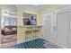 Kitchen features two barstools by a passthrough and double doors at 104 Seaman St, Oxford, NC 27565