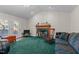 Spacious living room with a classic fireplace and comfortable seating area at 104 Seaman St, Oxford, NC 27565