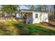 Backyard shed featuring ample storage space and convenient lawn access at 104 Seaman St, Oxford, NC 27565