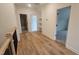 Upstairs hallway with hardwood floors and access to rooms at 105 Leisure Ln, Louisburg, NC 27549